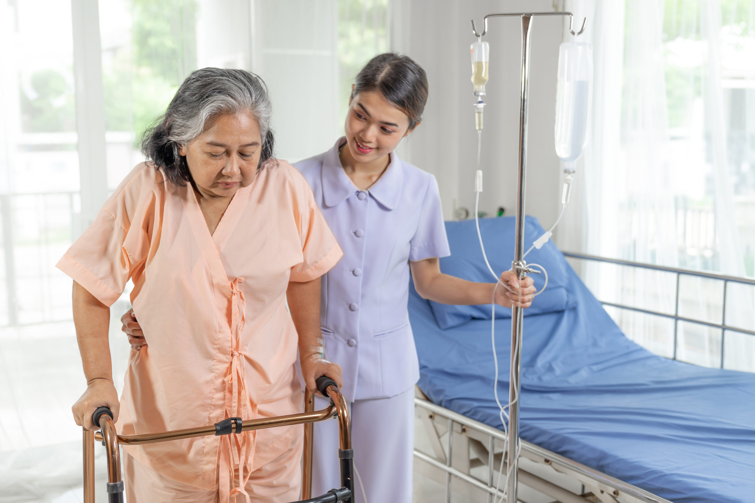 the nurses are well good taken care of elderly patients in hospital bed patients  feel happiness - medical and healthcare concept